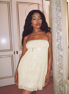 side view of model wearing Princess Polly Opalette Strapless Mini Dress Cream Straight Neck 