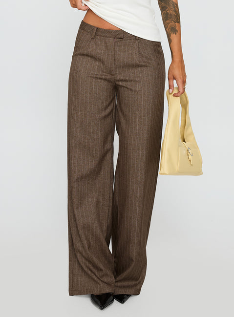 side view of model wearing Princess Polly Broadcast Pants Beige Pinstripe Low Rise Pants 