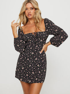 front view of model wearing Princess Polly Lyndon Long Sleeve Mini Dress Black / Floral Square Neck 