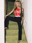 front view of model wearing Princess Polly Kinkirk Flared Pants Black Petite High Waisted Pants 