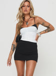 front view of model wearing Princess Polly Karley Skort Black High Waisted Shorts 