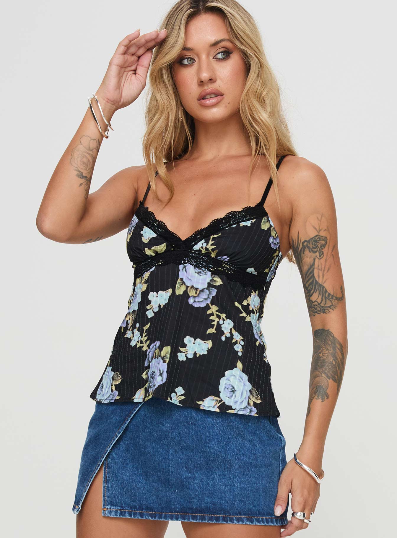 side view of model wearing Princess Polly Thexton Top Black Sleeveless V-Neck 