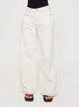 side view of model wearing Princess Polly Naylor Wide Leg Jeans Cream Mid Rise 