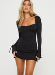 front view of model wearing Princess Polly Dalzine Long Sleeve Mini Dress Black Tall Sweetheart Neckline 