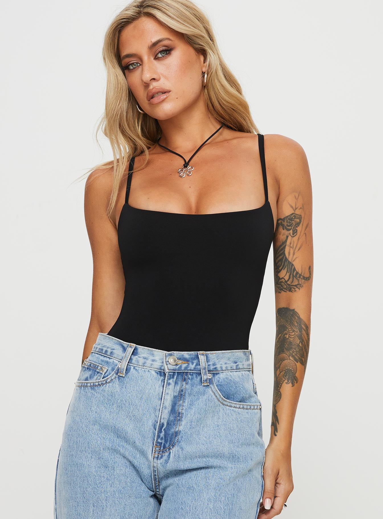 front view of model wearing Princess Polly Off Stage Bodysuit Black Sleeveless 