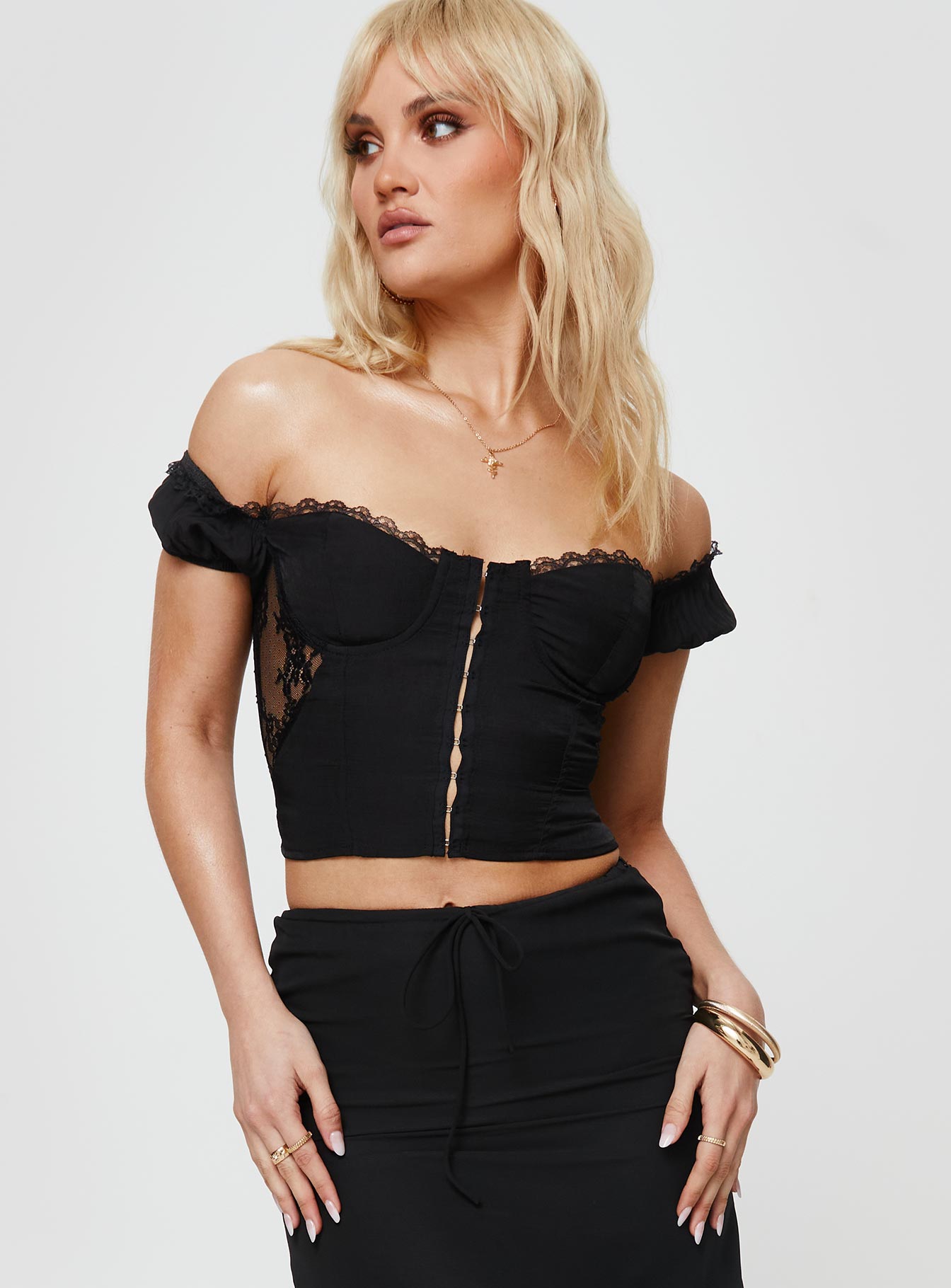 Front view of model wearing  front Princess Polly Short Sleeves Square Neck  Cooloola Corset Top Black
