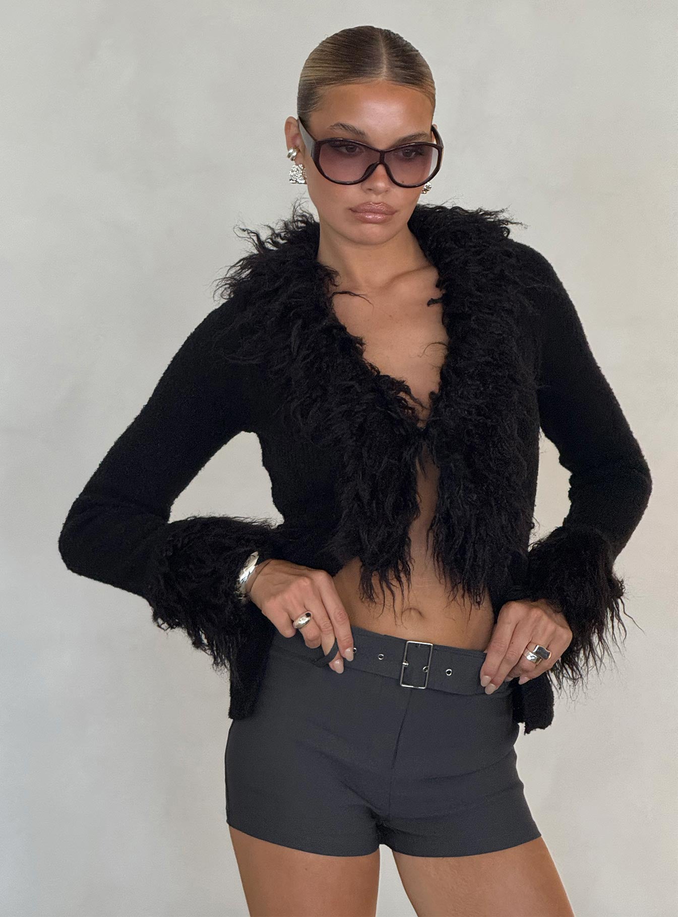 front view of model wearing Princess Polly Sistine Cardigan Black Longline Jumpers 