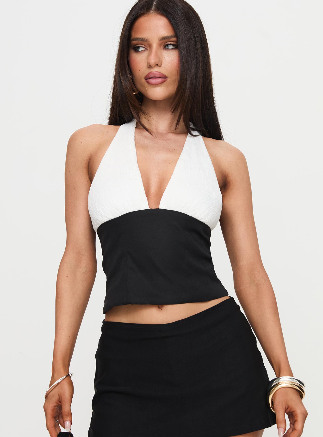 front view of model wearing Princess Polly Eyecatcher Halter Top Multi Sleeveless Plunger 