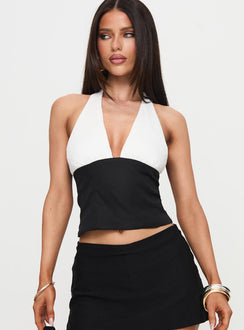 front view of model wearing Princess Polly Eyecatcher Halter Top Multi Sleeveless Plunger 