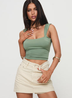 front view of model wearing Princess Polly Imelda Top Green Sleeveless Square Neck 