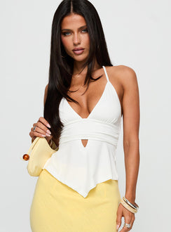 side view of model wearing Princess Polly Averee Halter Top White Sleeveless Plunger 