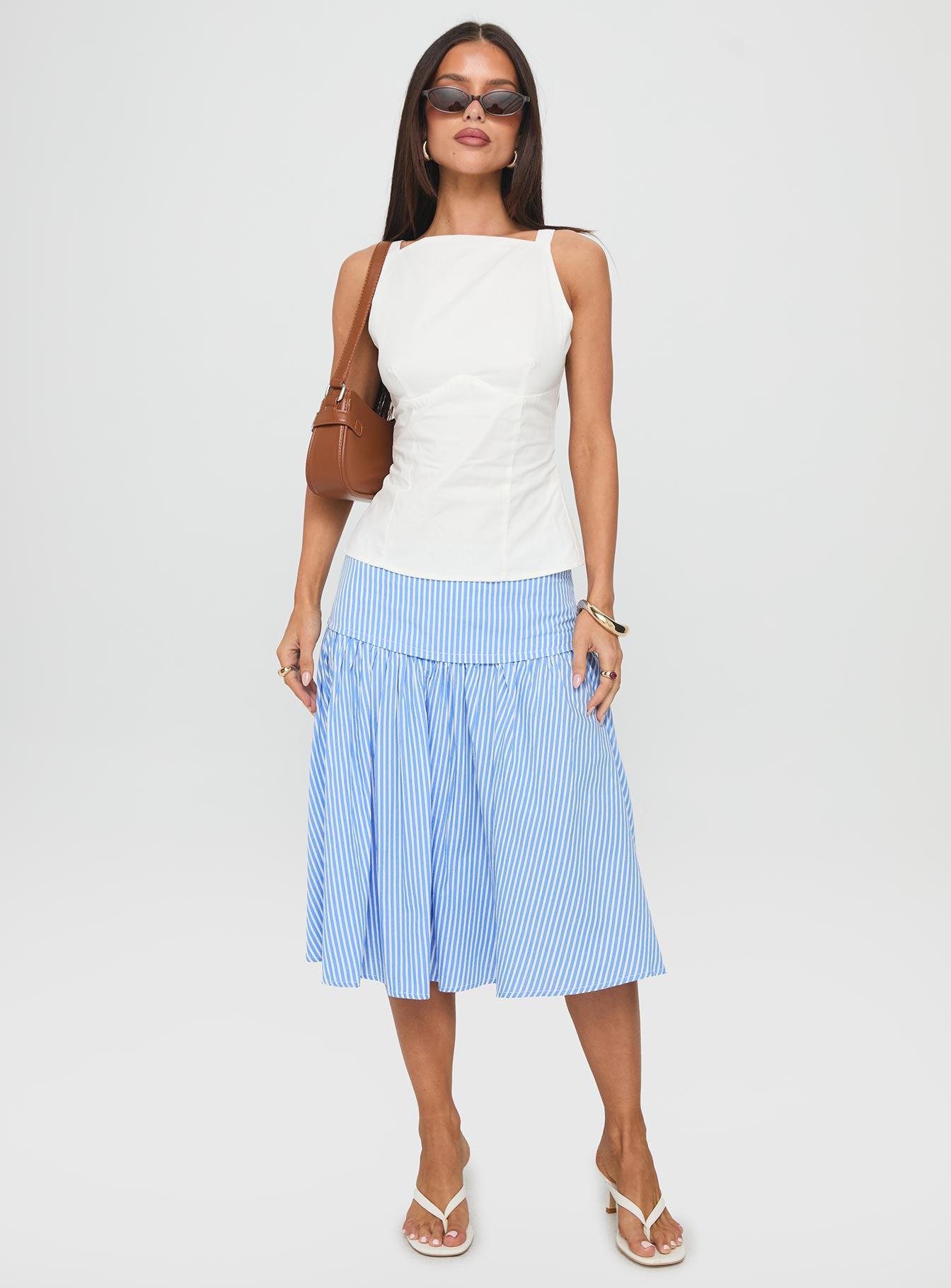   front view of model wearing Princess Polly Raelan Tiered Midi Skirt Blue Stripe Midi Skirts 