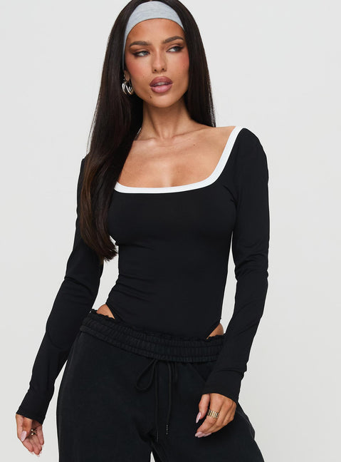 front view of model wearing Princess Polly Ender Contrast Trim Bodysuit Black Long Sleeve Tops 