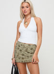   side view of model wearing Princess Polly Piazia Mini Skirt Green Mini Skirts 