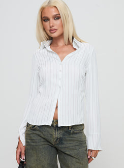 front view of model wearing Princess Polly Aldgate Long Sleeve Top White Full Sleeves V-Neck 