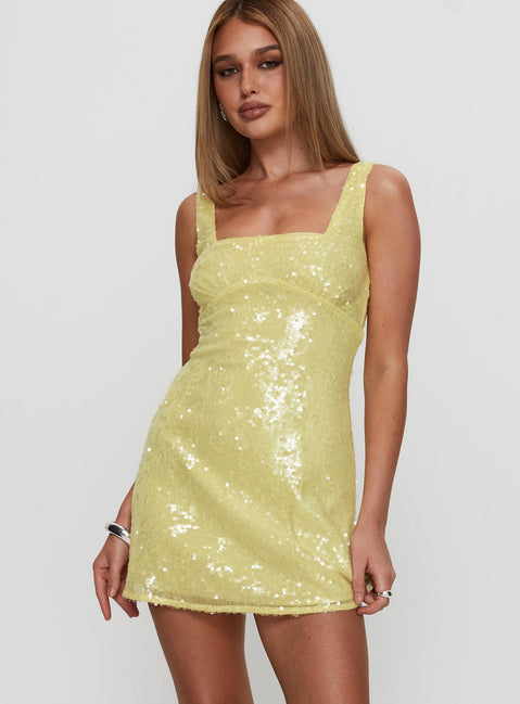 back view of model wearing Princess Polly Dasha Mini Dress Yellow Sequin Square Neck 