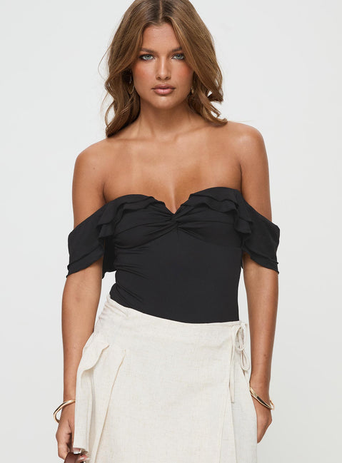 front view of model wearing Princess Polly Coming Back Ruffle Bodysuit Black Sleeveless 