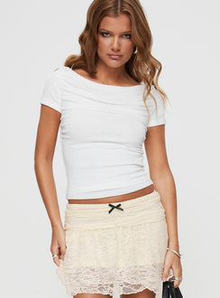 front view of model wearing Princess Polly Tywin Top White Short Sleeves Boat Neck 
