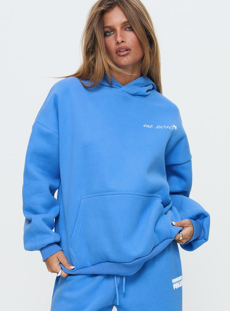 front view of model wearing Princess Polly Princess Polly Hooded Sweatshirt Bubble Text Blue / White 