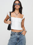 Crop top Fixed shoulder straps, button fastening down front, shirred band at back, split hem Non-stretch material, fully lined