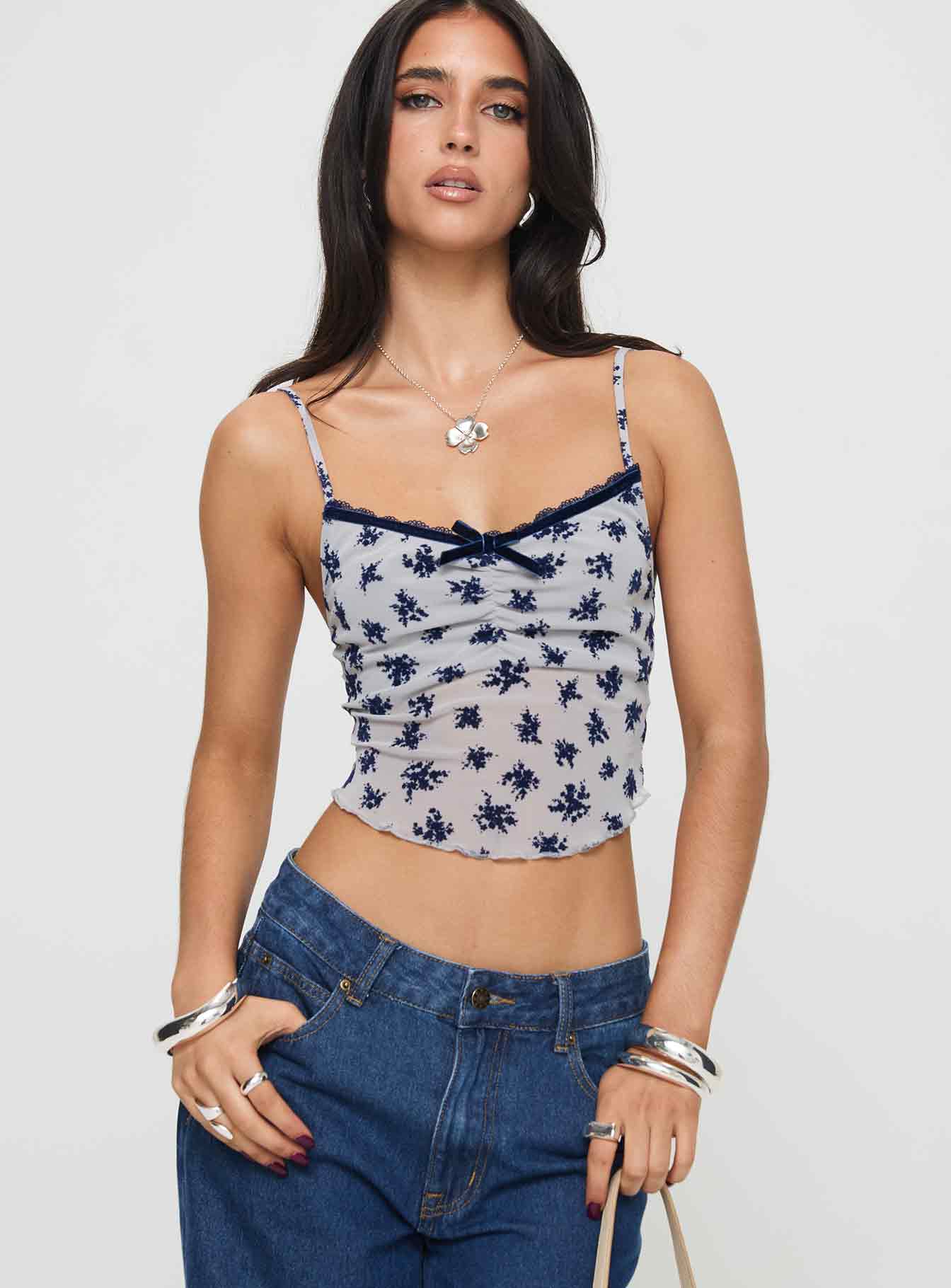 front view of model wearing Princess Polly Norde Top Floral Cluster Pale Grey Sleeveless V-Neck 