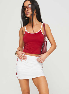 front view of model wearing Princess Polly Tex Skort White / Red 