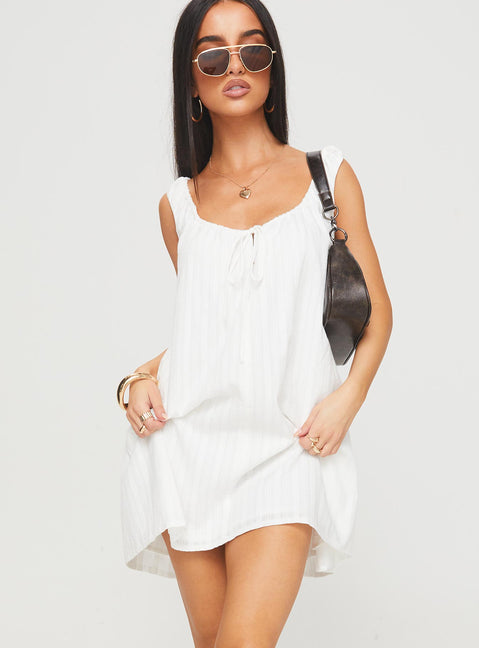 back view of model wearing Princess Polly Papaya Mini Dress White Scoop Neck 