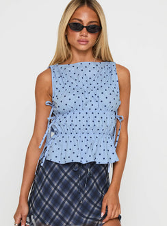front view of model wearing Princess Polly Endless Summers Tie Side Top Blue Polka Dot Sleeveless Boat Neck 
