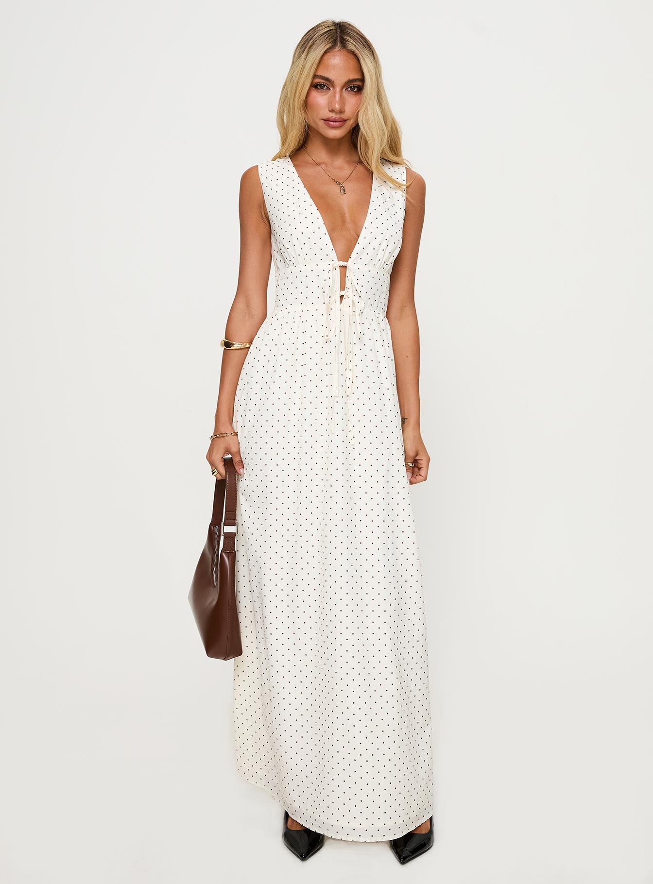 side view of model wearing Princess Polly Pokey Maxi Dress Cream / Polka Dot Plunger 