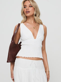 front view of model wearing Princess Polly Barletta Top White Sleeveless Plunger 