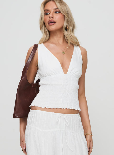 front view of model wearing Princess Polly Barletta Top White Sleeveless Plunger 