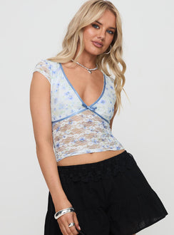 side view of model wearing Princess Polly Ocotillo Top White Short Sleeves Plunger 