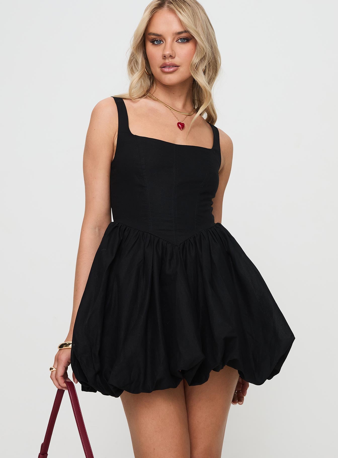 front view of model wearing Princess Polly Alcott Bubble Hem Mini Dress Black Square Neck 