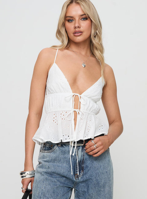 front view of model wearing Princess Polly Roux Top White Sleeveless Plunger 