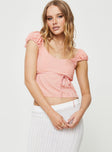 Front view of model wearing  front Princess Polly Short Sleeves Cowl  Seacrest Top Pink