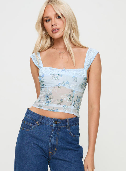 side view of model wearing Princess Polly Mallorca Top Blue Sleeveless Square Neck 