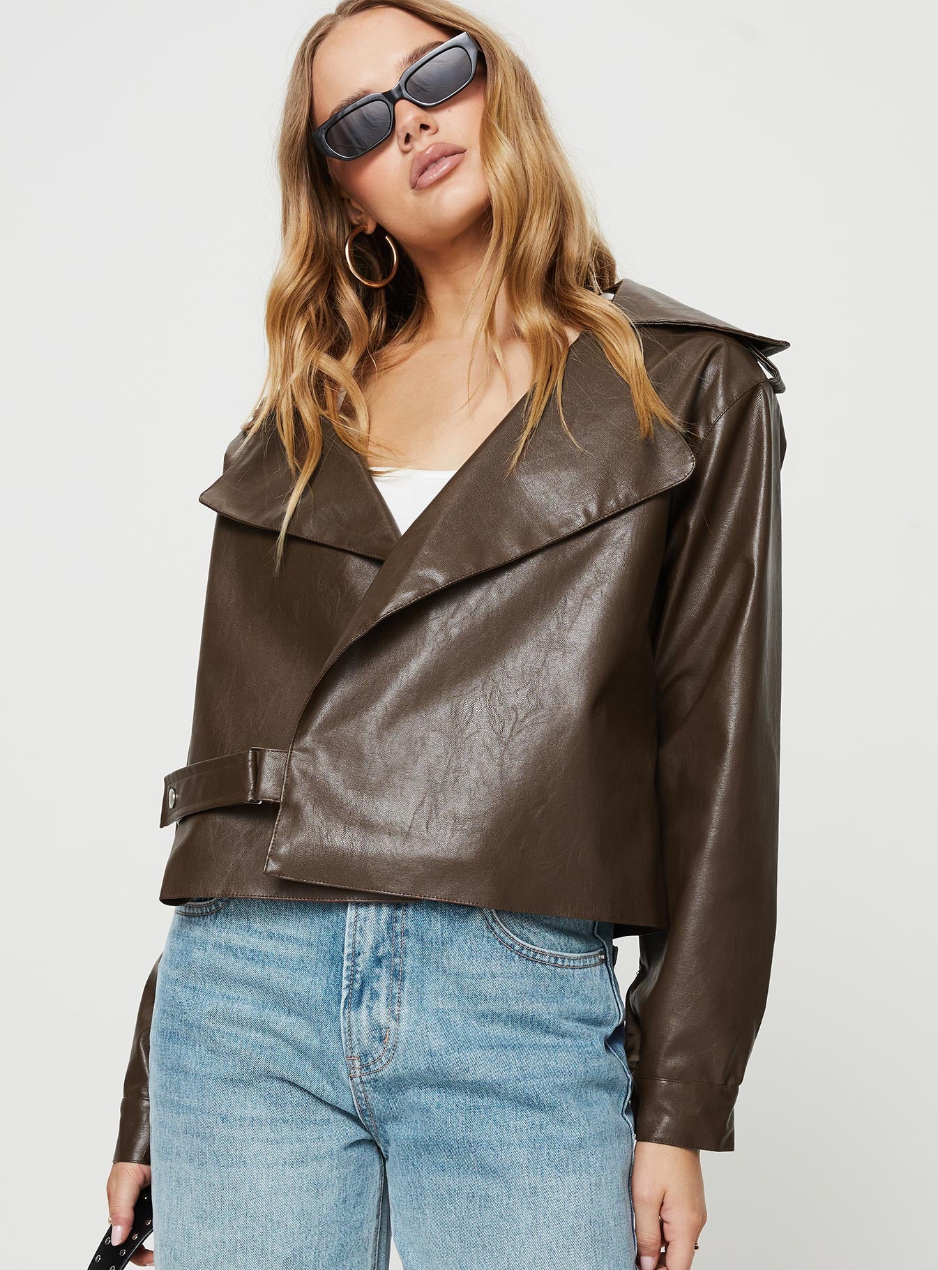 Oversized jacket Faux leather material, lapel collar, button fastening, snap button at cuff Non-stretch, fully lined