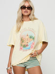 front view of model wearing Princess Polly Hotel Hawaii Oversized Tee Yellow Half Sleeves Crew Neck 