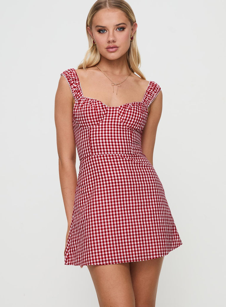 front view of model wearing Princess Polly Faubert Mini Dress Red Gingham Sweetheart Neckline 