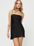 Front view of model wearing  front Princess Polly Asymmetric Neckline  Carvey Mini Dress Black