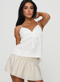 side view of model wearing Princess Polly Hickory Top White Sleeveless V-Neck 