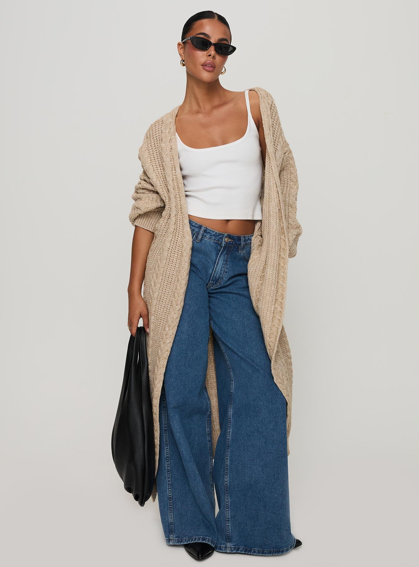 front view of model wearing Princess Polly Orkid Cable Knit Cardigan Beige Long 