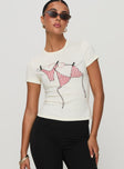 front view of model wearing Princess Polly By The Seaside Graphic Top Cream Short Sleeves Crew Neck 