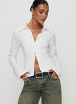 front view of model wearing Princess Polly Foxley Long Sleeve Top White Full Sleeves V-Neck 