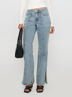 side view of model wearing Princess Polly White Mustang Side Split Jean Light Blue Mid Rise 