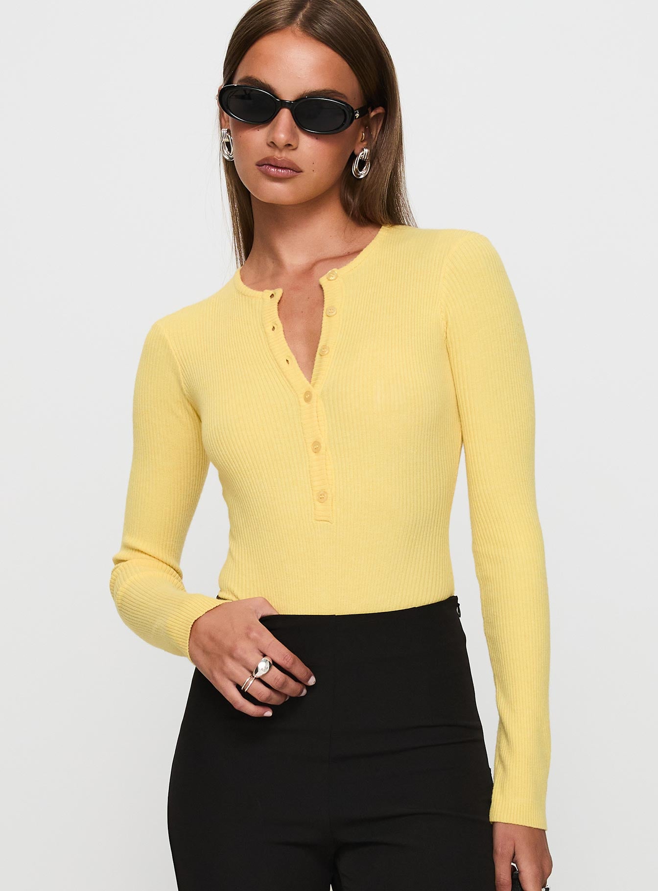 front view of model wearing Princess Polly Kerra Long Sleeve Bodysuit Lemon Full Sleeves 