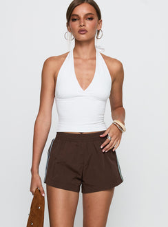 front view of model wearing Princess Polly Borderline Track Short Brown / Blue High Waisted Shorts 