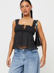 front view of model wearing Princess Polly Mooney Top Black Sleeveless Square Neck 