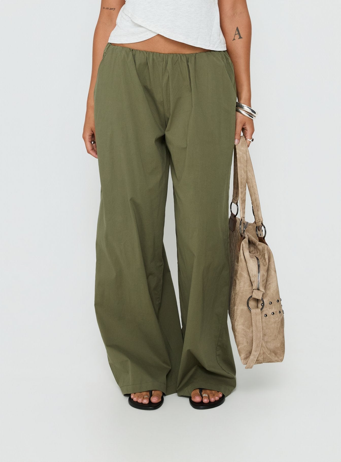 back view of model wearing Princess Polly Lunea Concealed Waistband Pants Khaki Low Rise Pants 