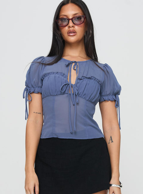 front view of model wearing Princess Polly Coates Top Blue Short Sleeves Crew Neck 